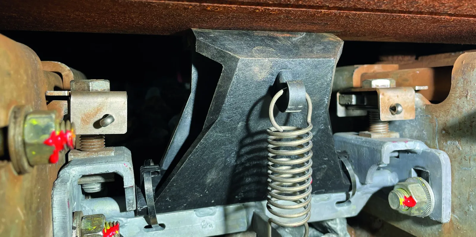 Close-up of the DeltaSwitch pendulum block and tension spring